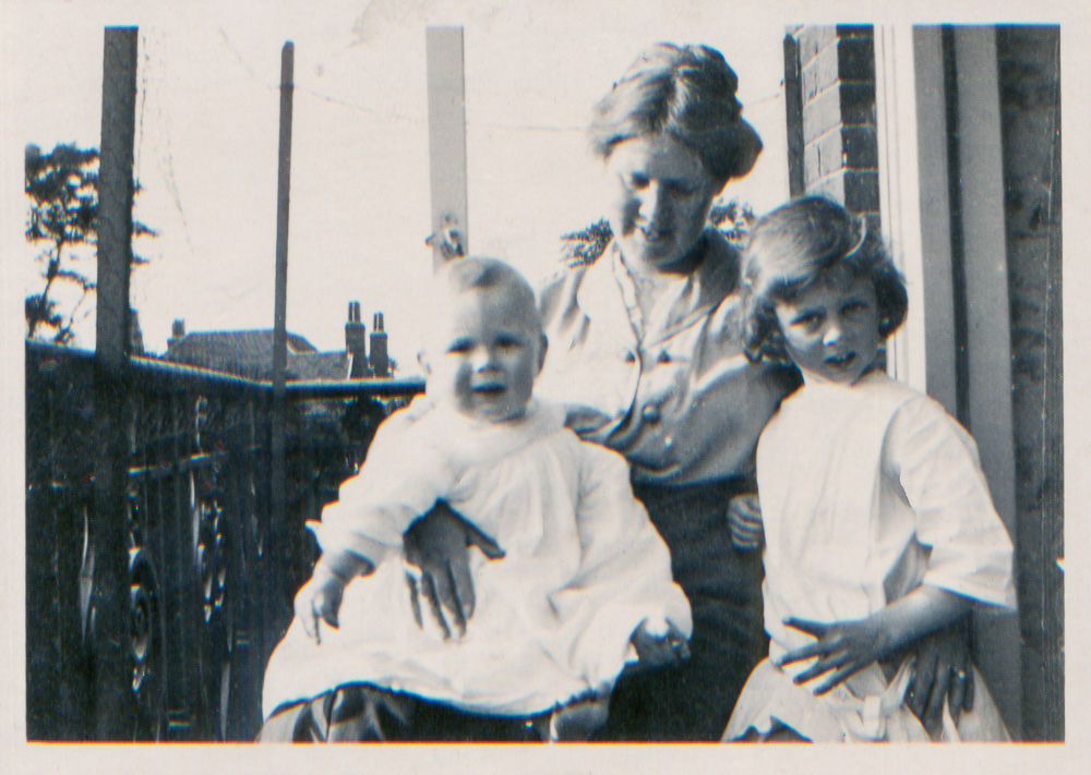 Eva, Philip and Alys on balcony 8 Heath Mansions